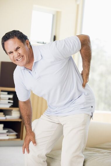 the husband has back pain in the lumbar region